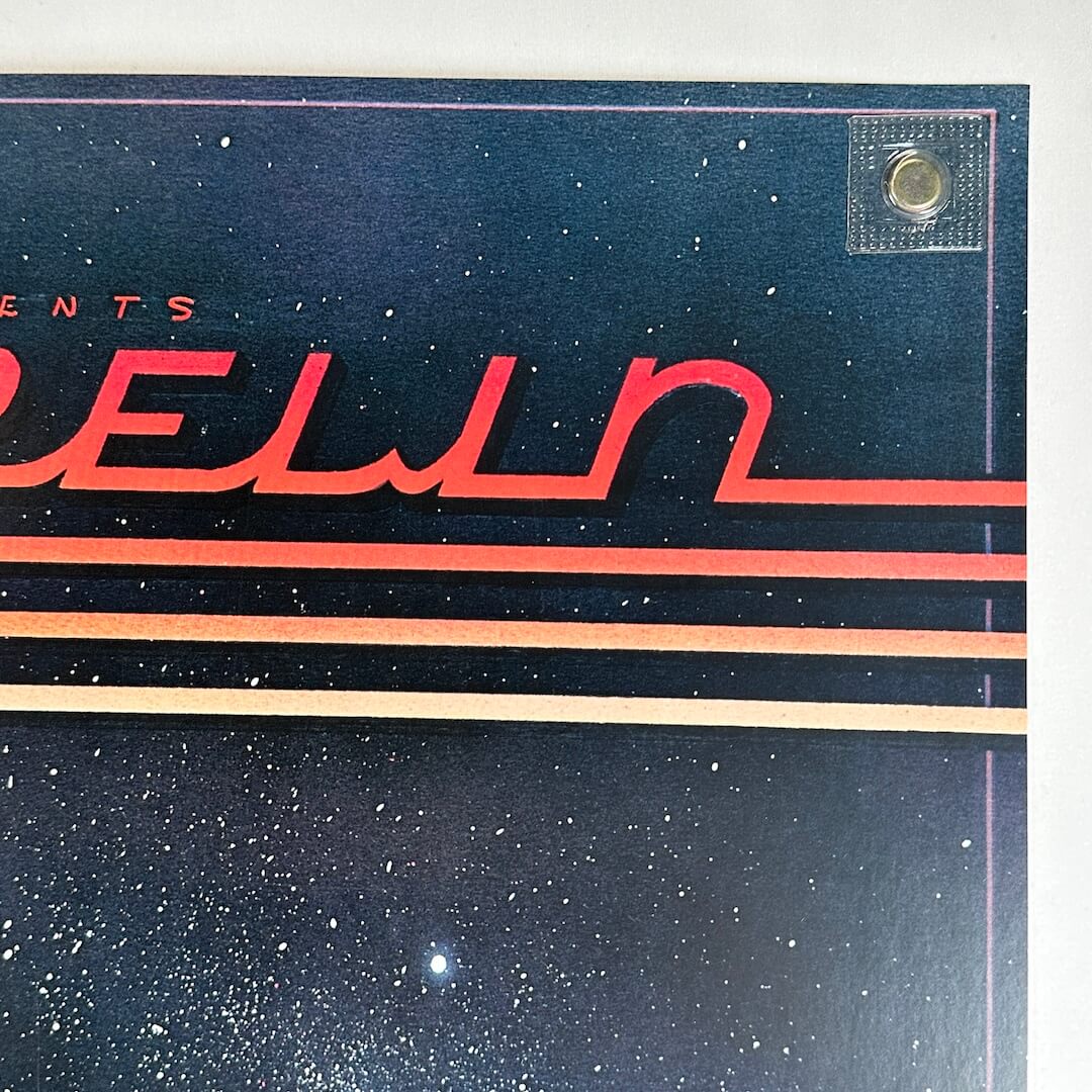 Top right corner of poster with no visible damage.