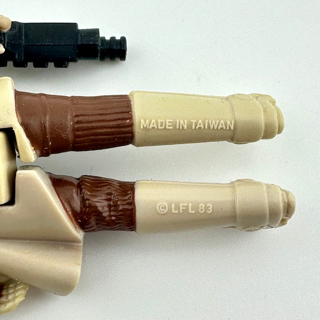 Close-up of back of Leia's legs showing the COO and copyright information embossed into leg. 