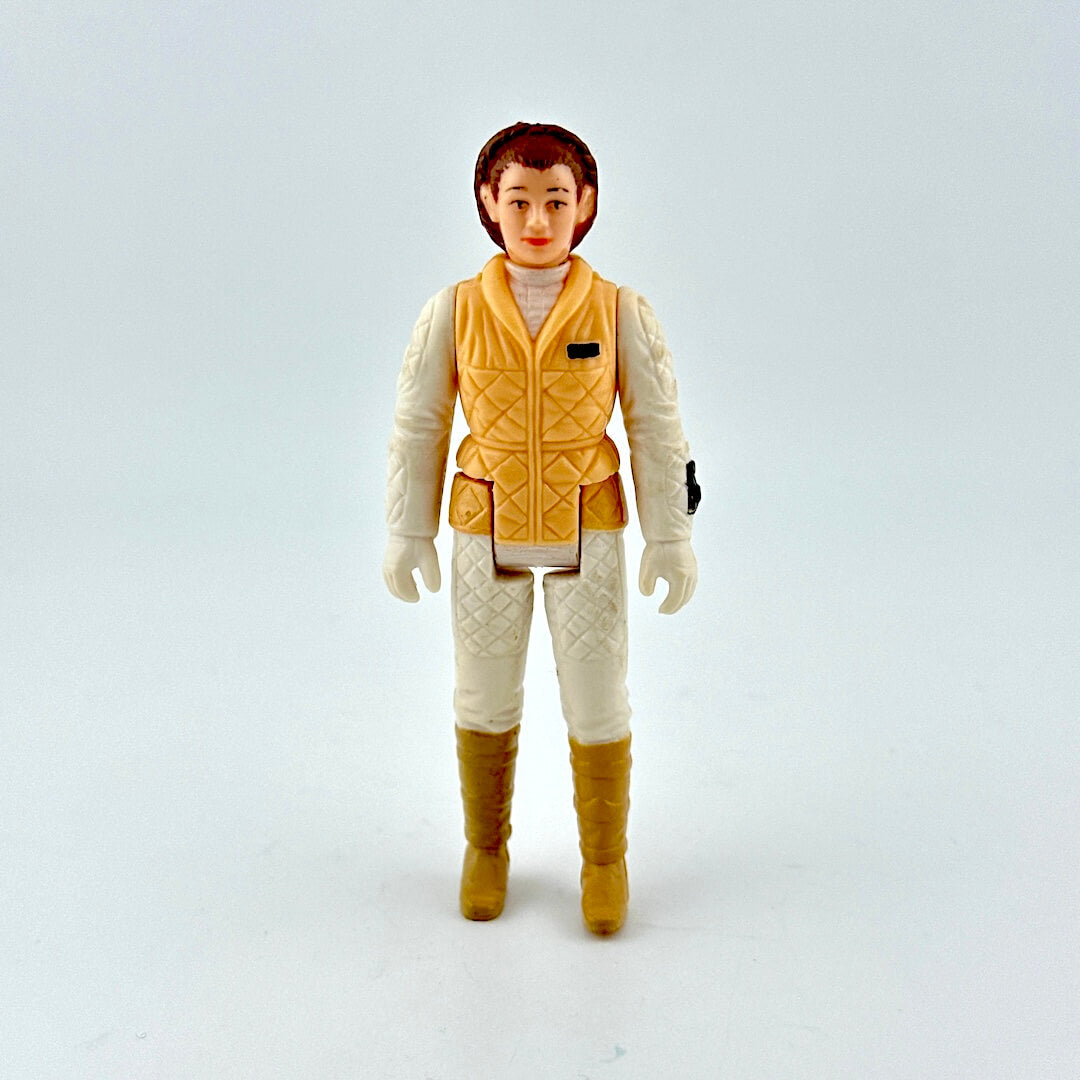 Action figure in a yellow vest and white outfit on a light gray background