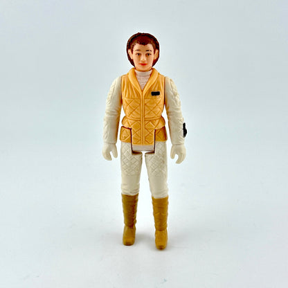 Action figure in a yellow vest and white outfit on a light gray background