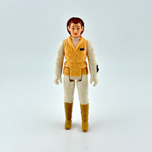 Action figure in a yellow vest and white outfit on a light gray background