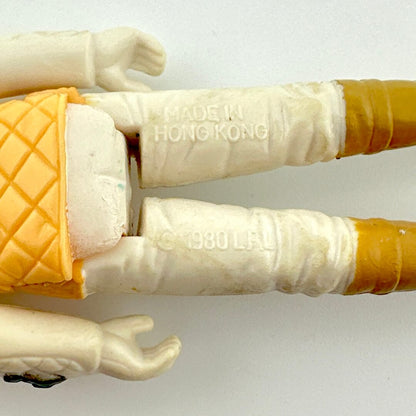 Close-up of back of figure's legs to show copyright and COO information. 
