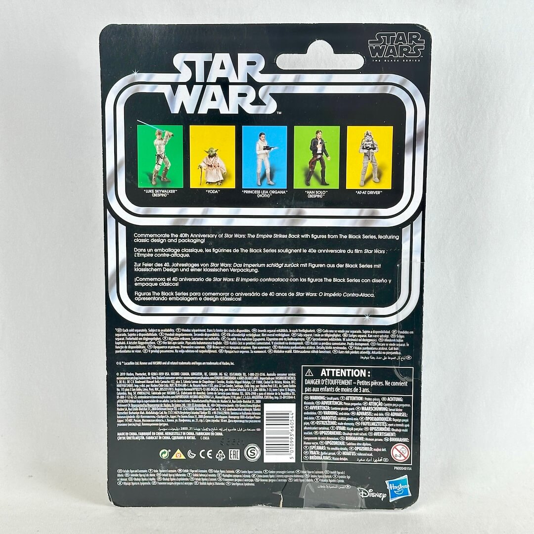 Star Wars action figure blister card packaging, showing the back of the card with character windows, & product details.
