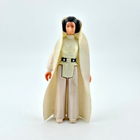 Action figure of a character in a long white robe on a white background