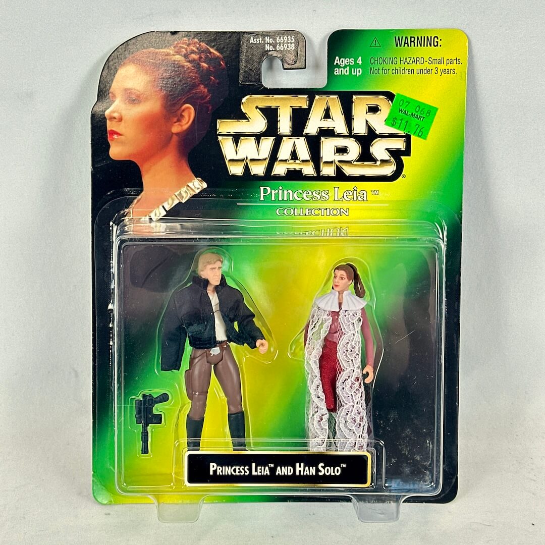 Star Wars action figure packaging featuring Princess Leia and Han Solo on a gray background