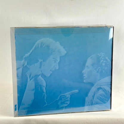 A square blue box featuring a monochrome illustration of two people in profile.