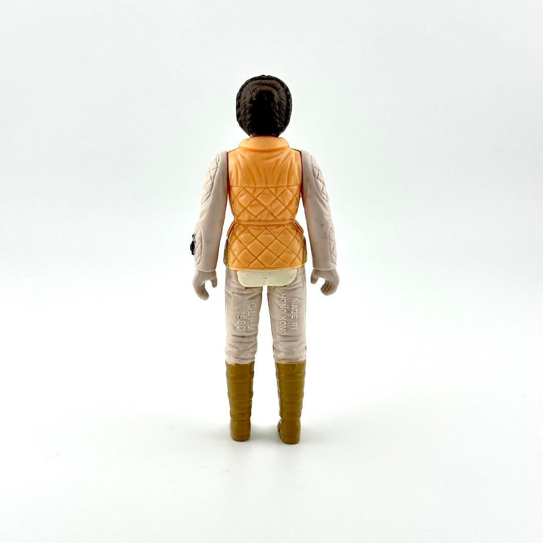 Action figure of Leia in her Hoth outfit, no accessory, standing against white background.