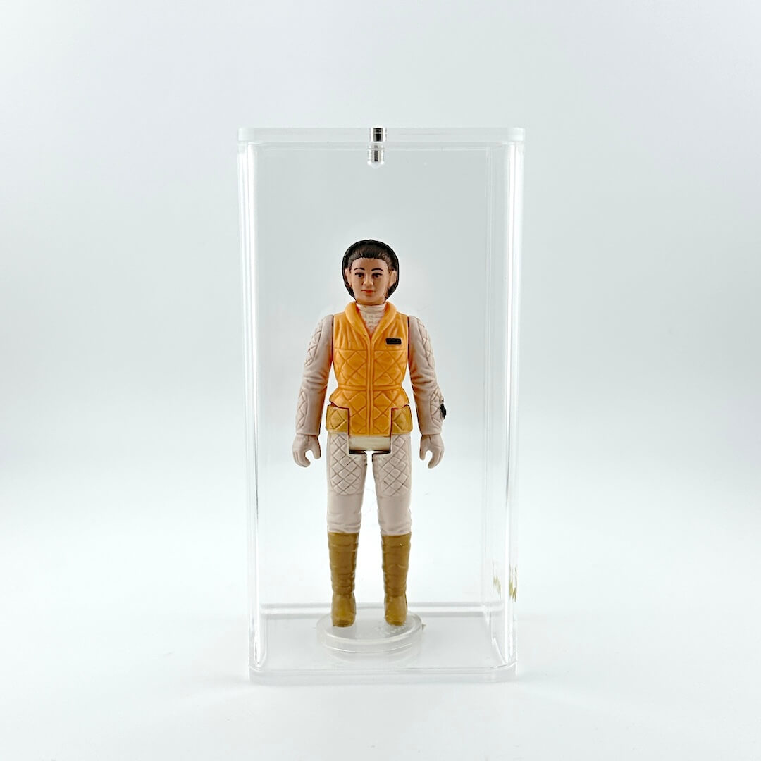 Action figure of Leia in her Hoth outfit, no accessory, standing against white background inside clear plastic case