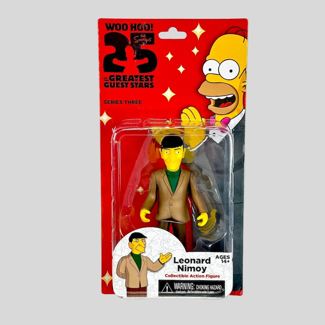 Action figure of Leonard Nimoy from The Simpsons series, packaged in a red and yellow display card.