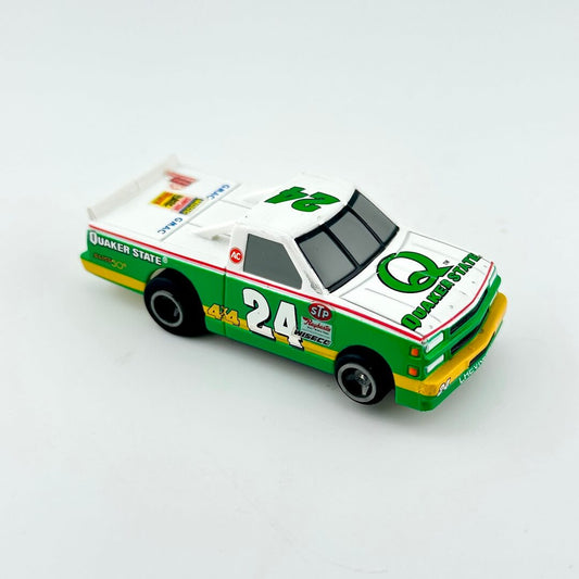Model race car with Quaker State branding on a white background