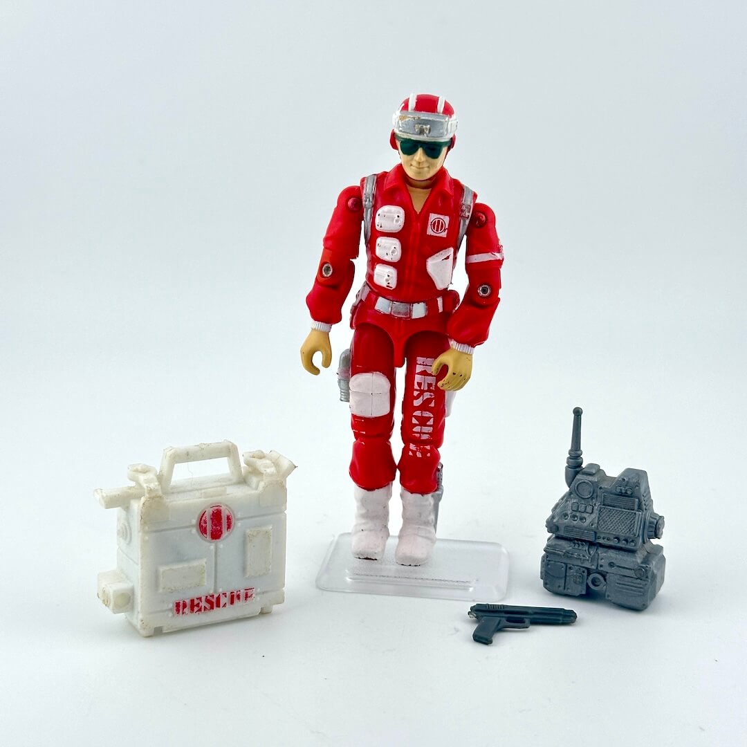 Toy figure in red uniform with accessories on a white background