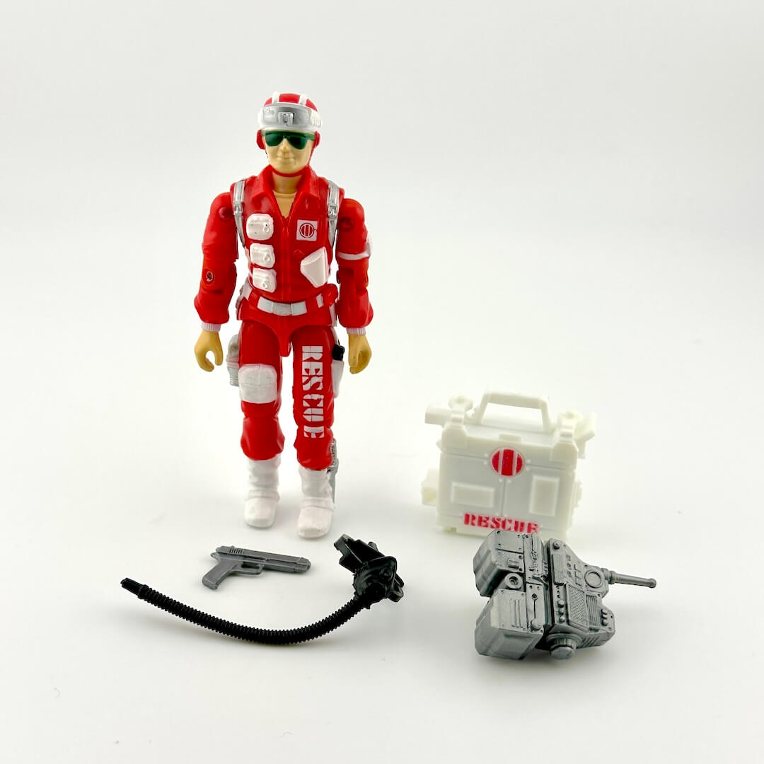 Toy figure in red and white uniform with accessories on a white background