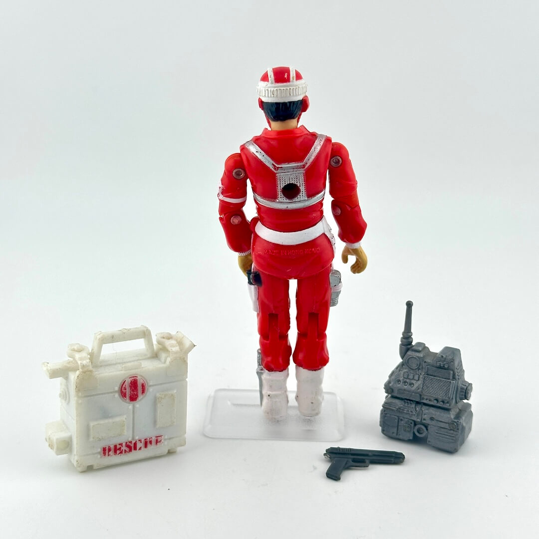 Red action figure with accessories on a white background