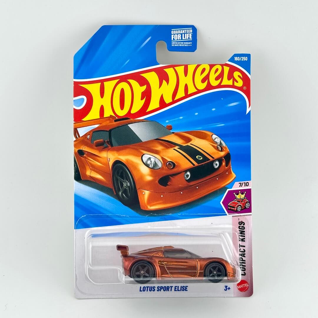 A Hot Wheels Compact Kings Lotus Sport Elise toy car in its original blister card packaging, featuring an orange car.