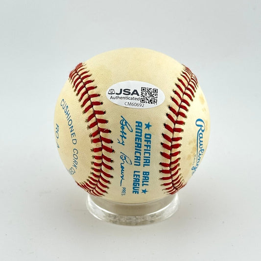 Baseball with JSA authentication label on a white background