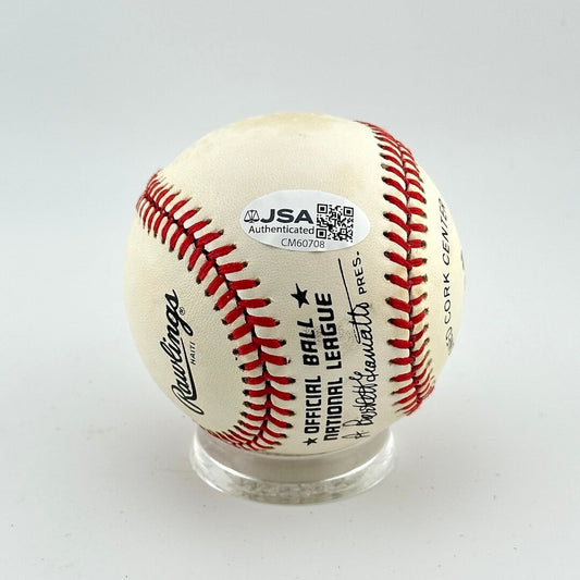 Baseball with Rawlings logo and JSA authentication label on a white background