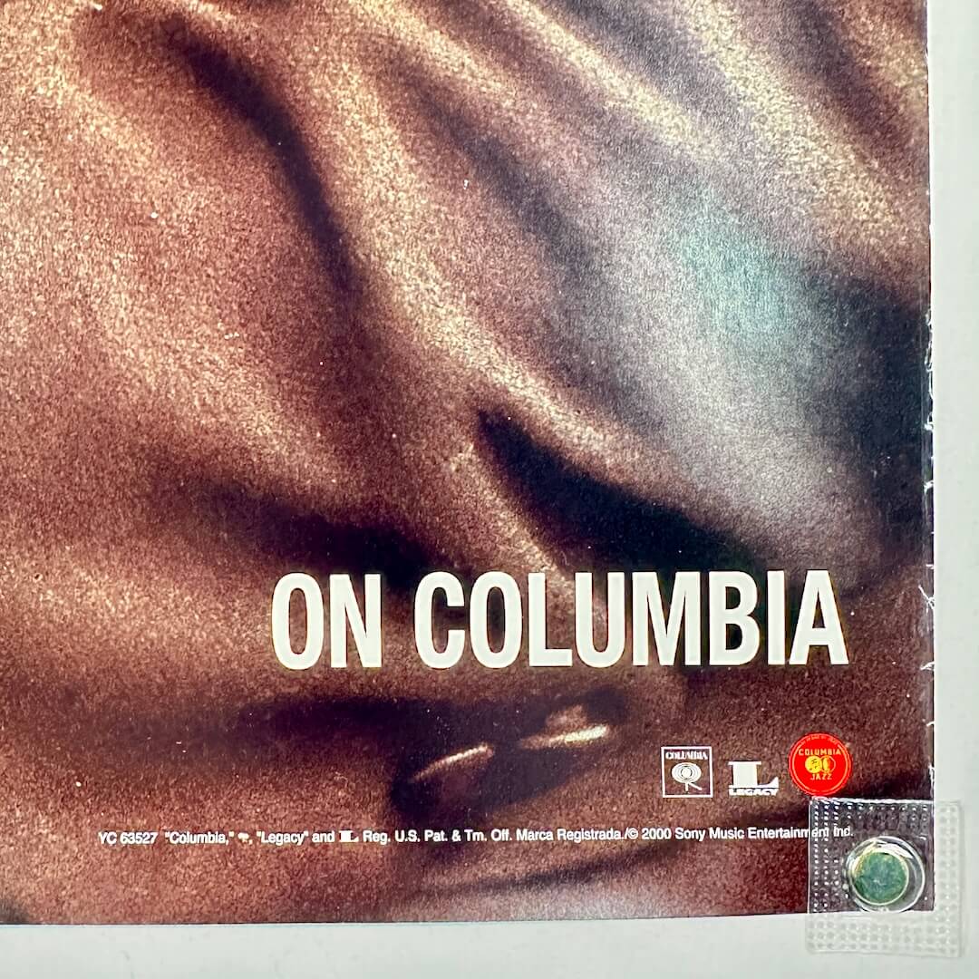 Bottom right corner of poster with some edge wear and licensing information. 