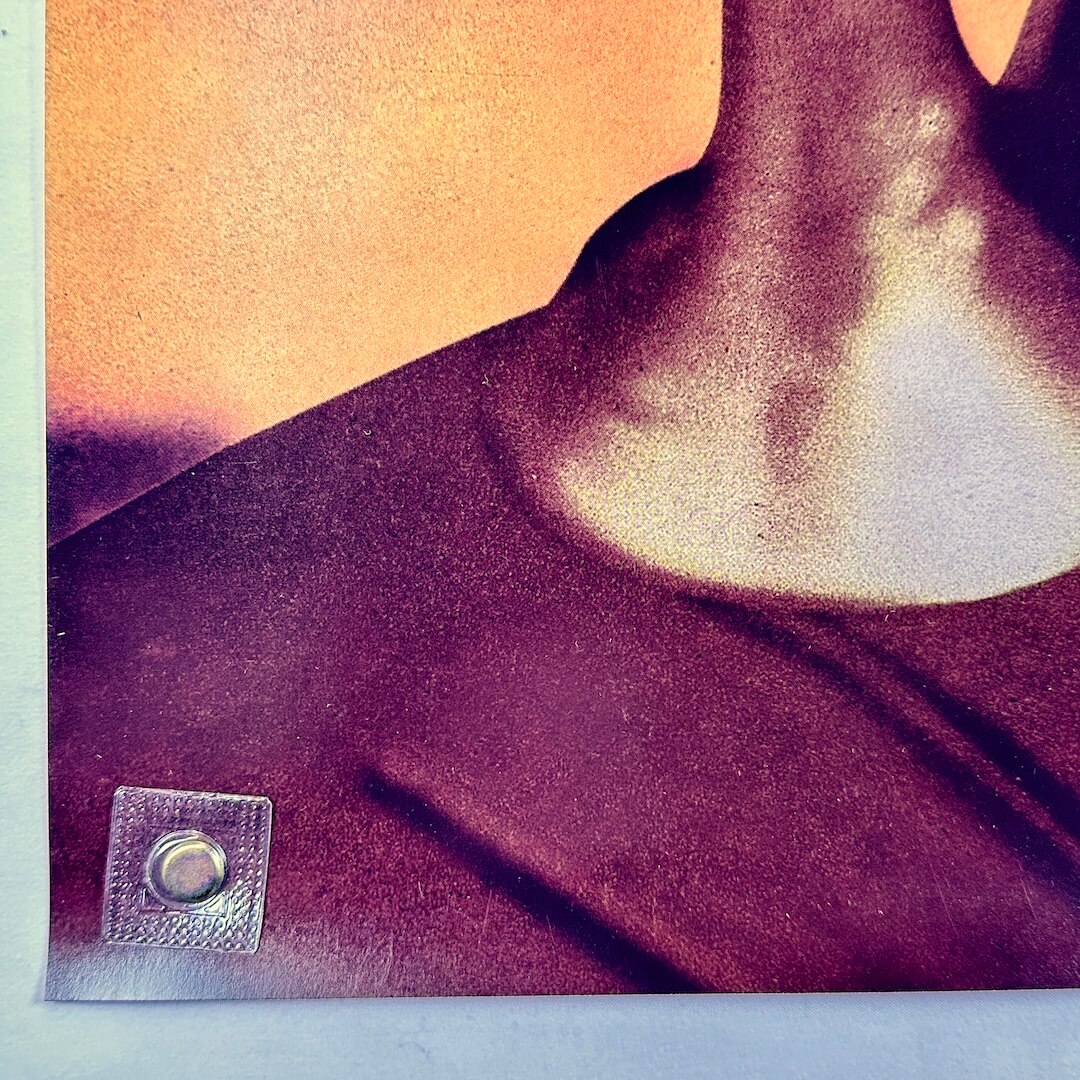 Bottom left corner poster with no damage. 