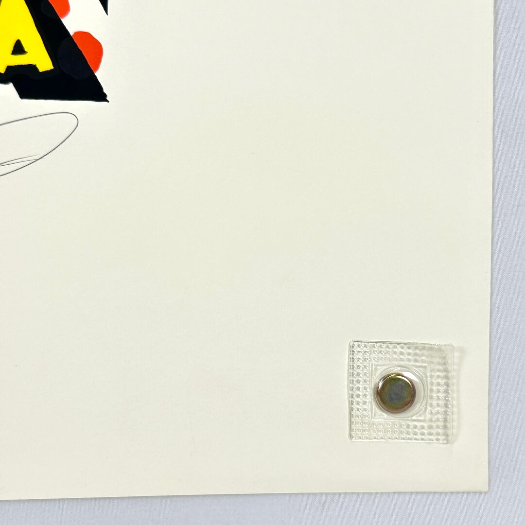 Bottom right corner of poster showing crisp corner and clean edges. 