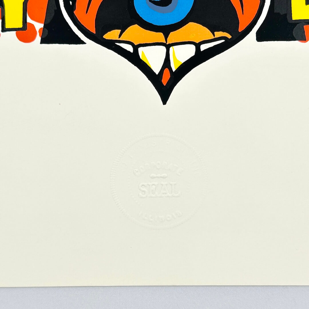 Bottom left corner of poster showing crisp corner and clean edges. Features artist's embossed seal. 