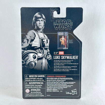 Back of a Star Wars The Black Series Luke Skywalker action figure package, showing character art, & product name.