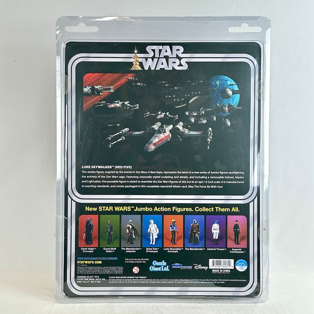 Star Wars Luke Skywalker jumbo action figure in its original clear plastic blister packaging, showing the back of the card.