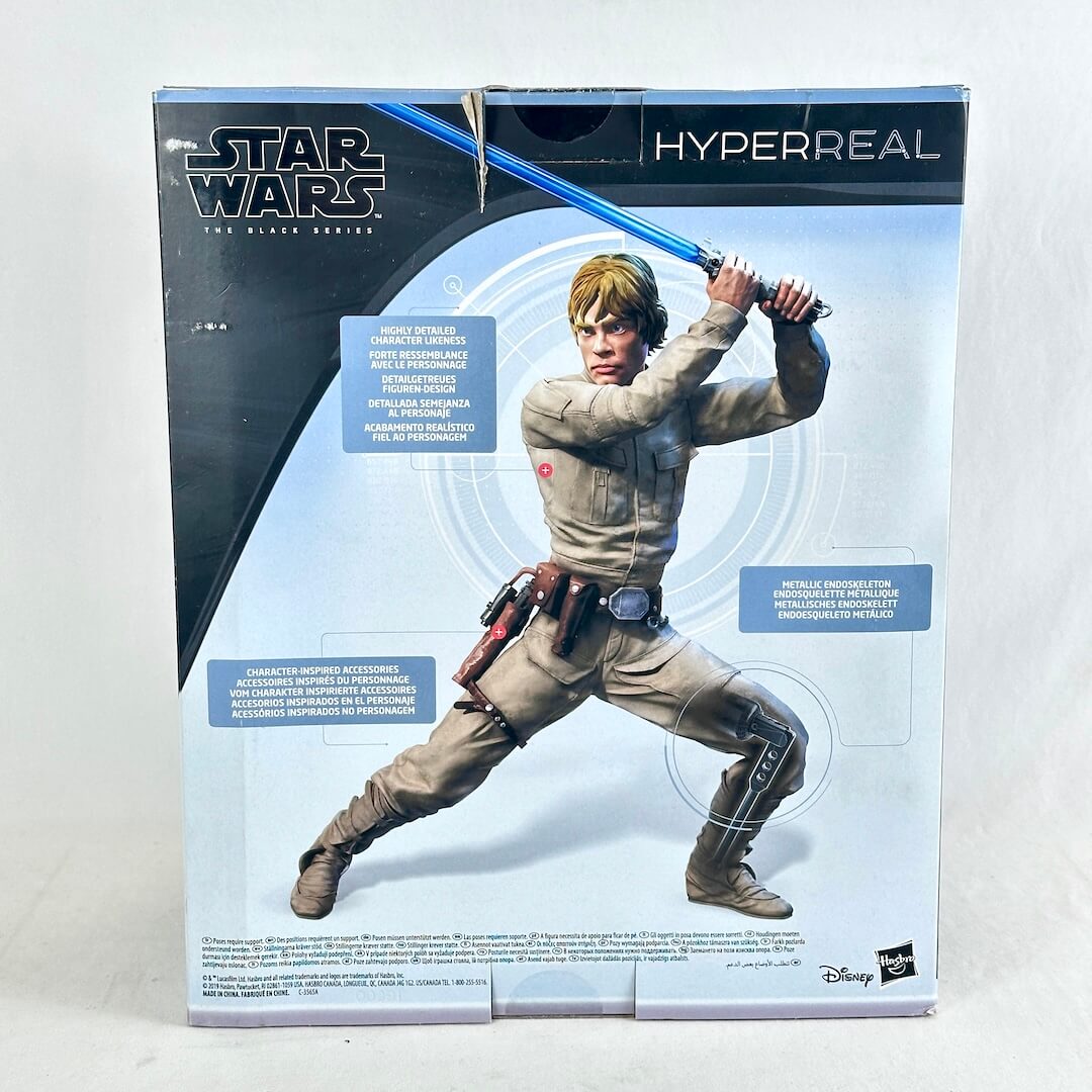Star Wars Hyperreal action figure of Luke Skywalker shown in its original packaging on a light gray background.