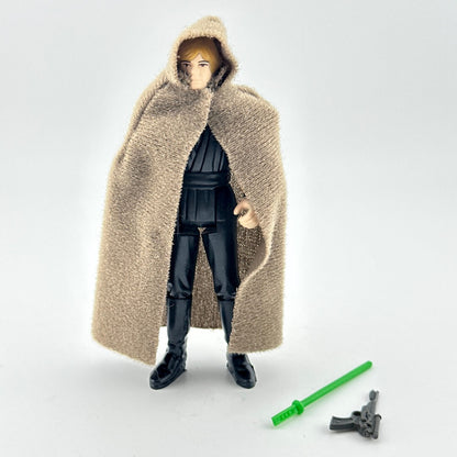 Action figure in a long coat with a lightsaber and gun on a white background
