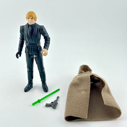Action figure with two weapons and a cloak accessory on white background. 