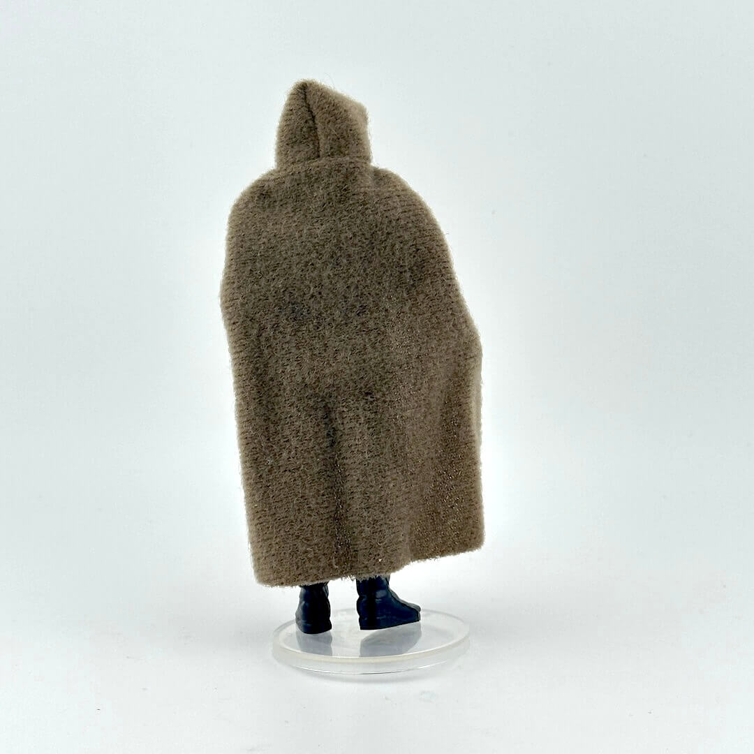 Brown textured coat on an action figure against a white background