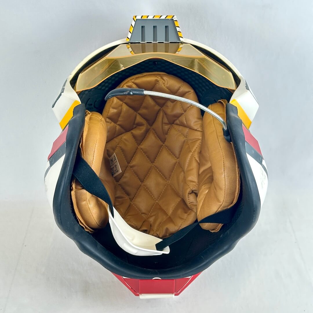 Interior view of replica helmet to show cushions for wearing. 
