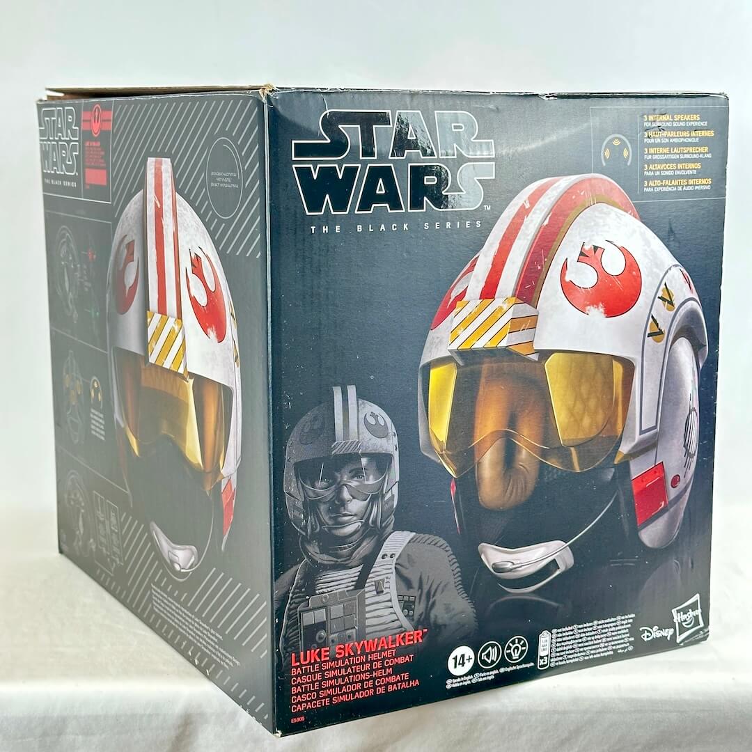 Star Wars The Black Series Luke Skywalker collectible helmet box, featuring artwork of a white Rebel helmet.