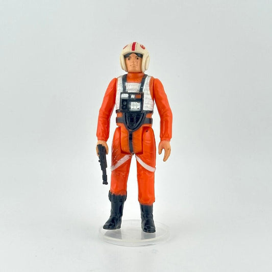 Action figure in an orange suit with a helmet on a white background