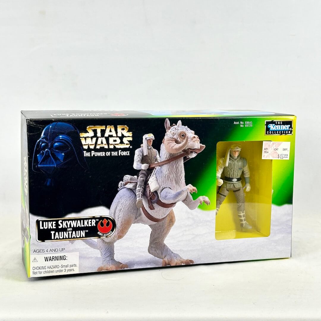 Star Wars toy figure of Luke Skywalker on a tauntaun in packaging