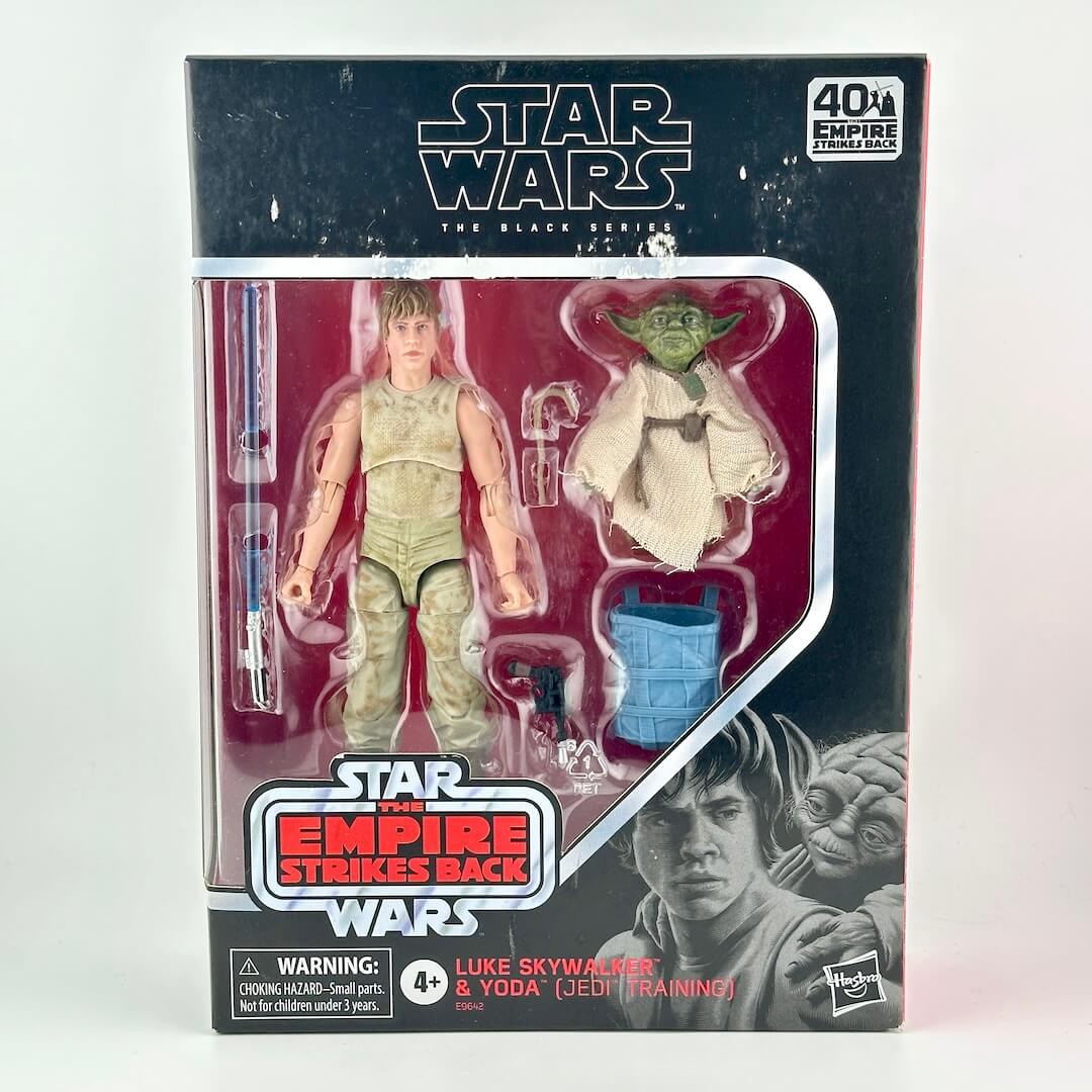 Star Wars The Black Series Luke Skywalker and Yoda action figure set in its original window box packaging.