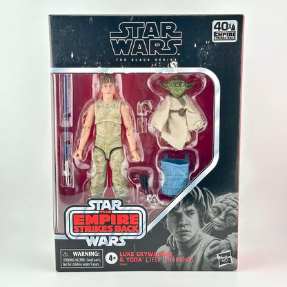 Star Wars The Black Series Luke Skywalker and Yoda action figure set in its original window box packaging.