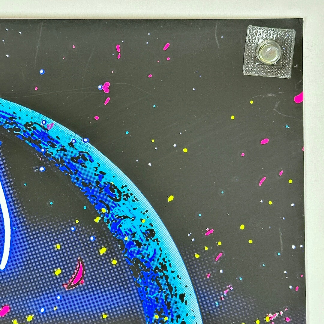 Top right corner of poster with crisp corner and clean edges. Light scratches to face. 