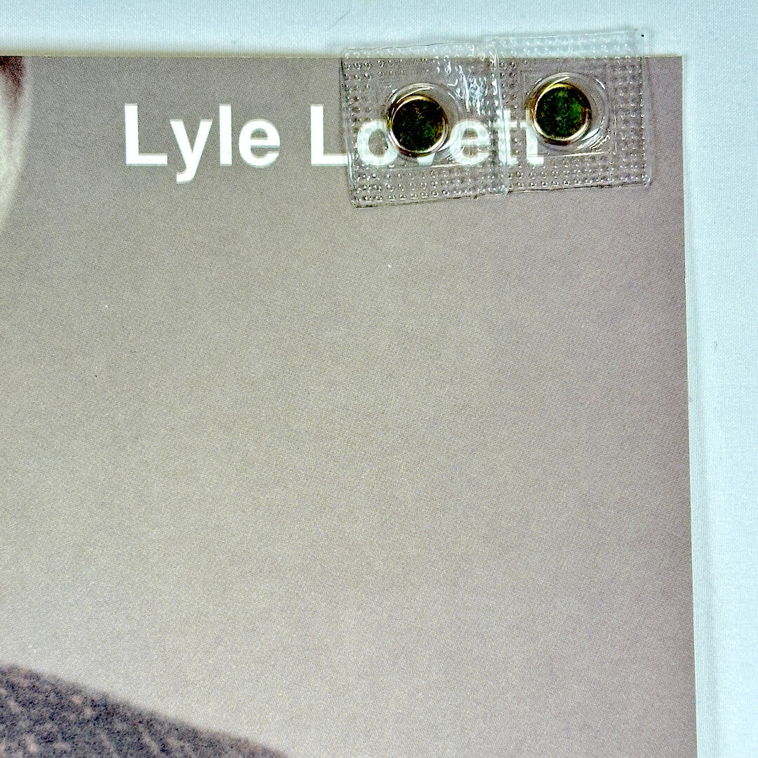 Top right corner of poster with no damage.