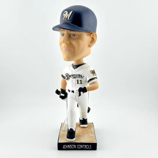Baseball bobblehead figure wearing a uniform with a cap on a white background