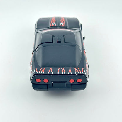 A black toy car with red and white graphic stripes on the hood and trunk.