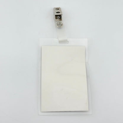 Backside of badge with bend in it. 