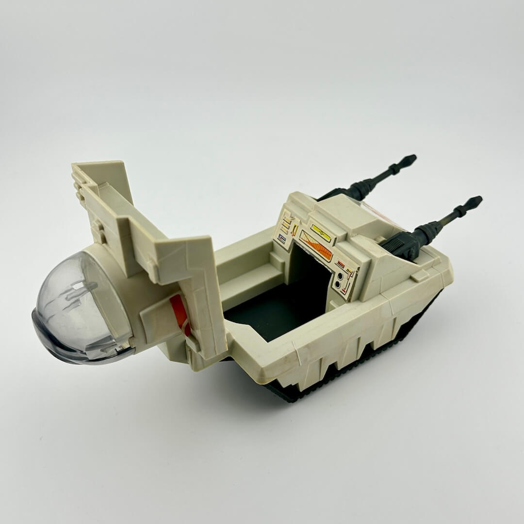Toy vehicle with a transparent dome on a white background