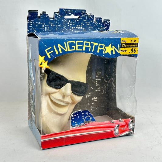 Fingertron toy in packaging with cityscape design