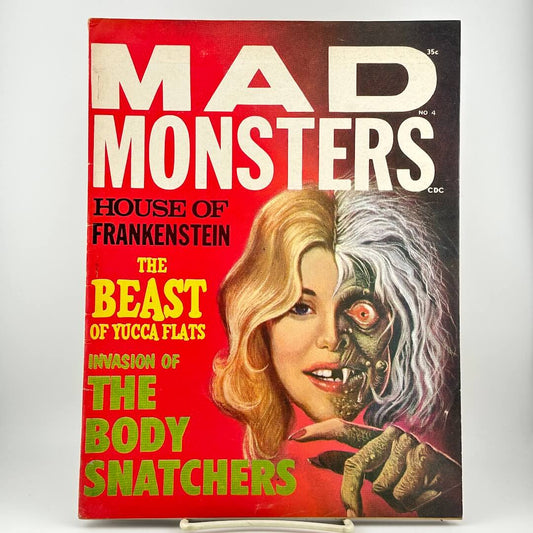Vintage Mad Monsters No. 4 comic book cover featuring a split illustration of a woman's face. 