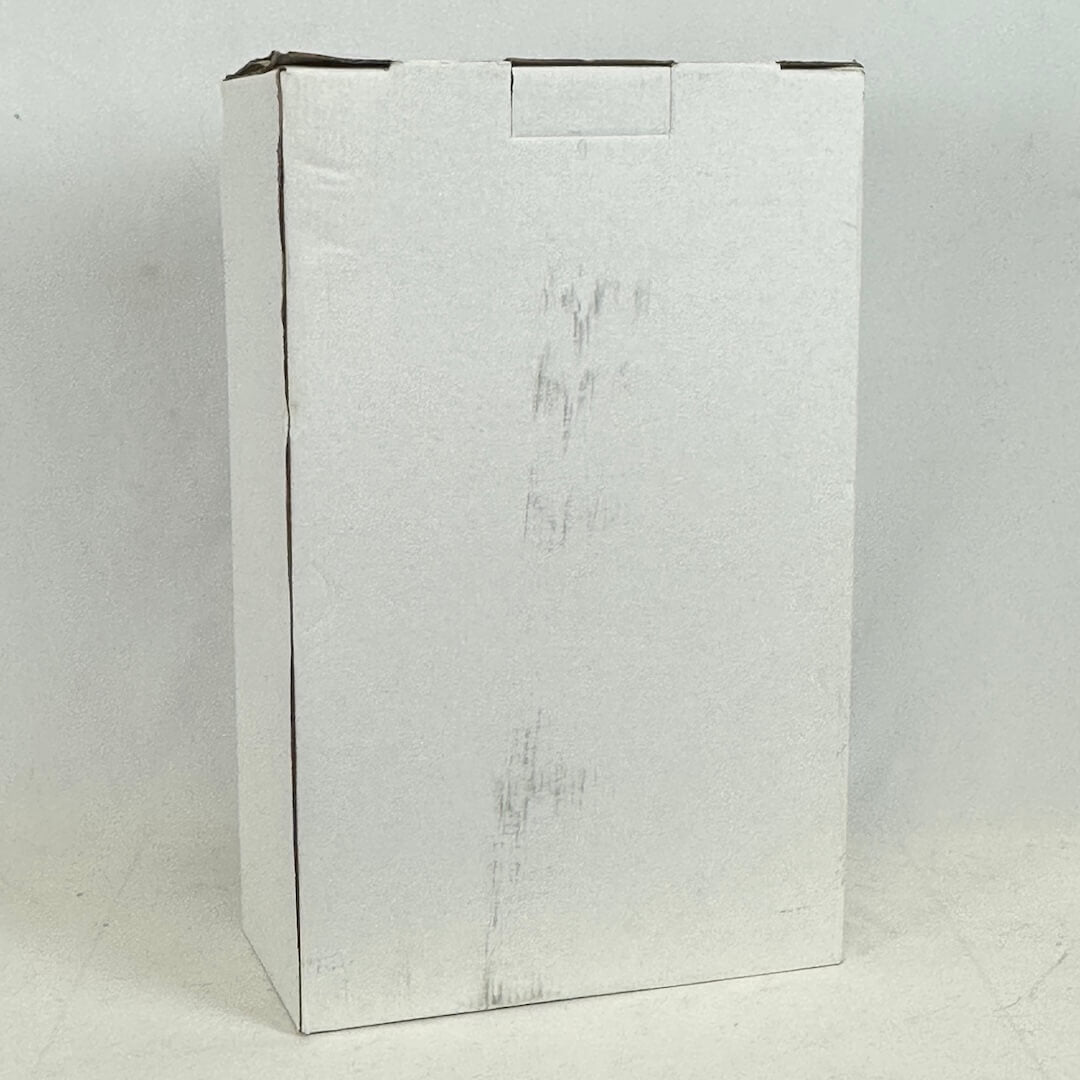 White textured cardboard box on a light gray background