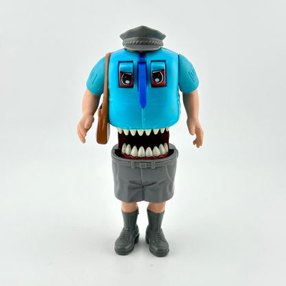 Toy figure with a blue shirt, gray pants, and a brown bag on a white background