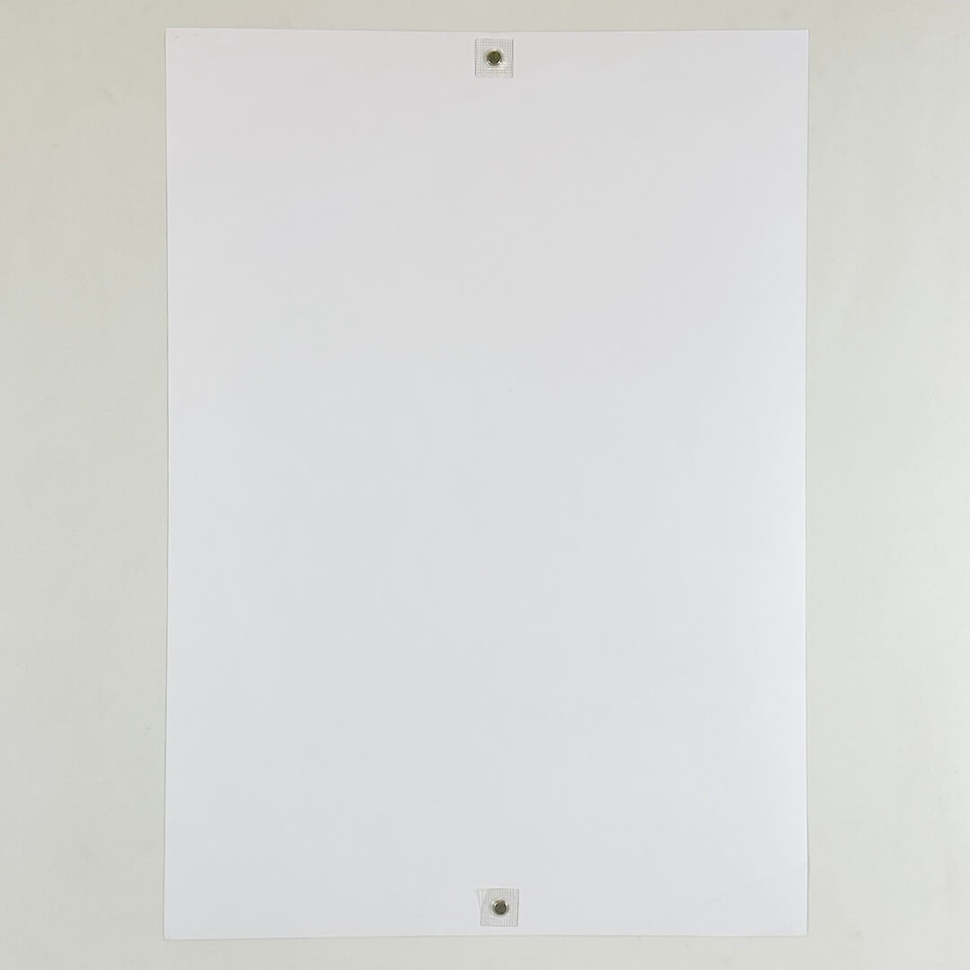 Backside of print on white background. 