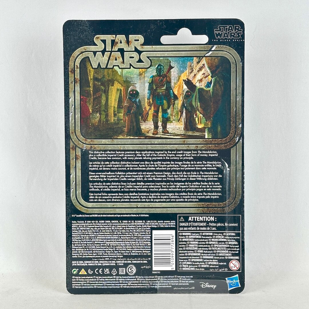 Back of Star Wars action figure packaging showing character art and product details. 