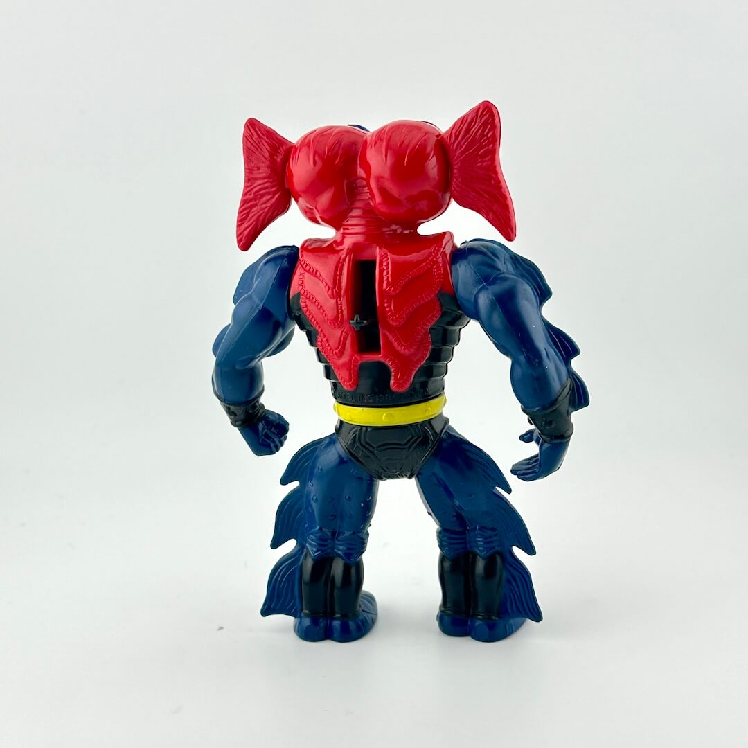 He-man action figure with blue body, a red head and red chest. 