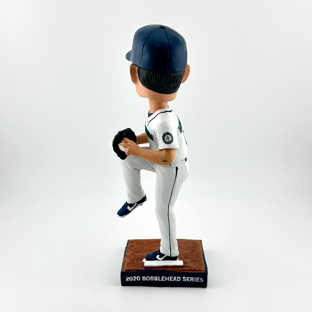 Baseball bobblehead figure in a pitching pose on a white background
